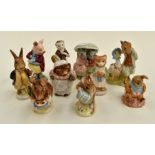 Group of ten Beswick and Royal Albert Beatrix Potter statues including Susan