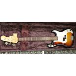 Fender Precision bass guitar with hard case, serial number E773263, made in Japan, 1983-87, still