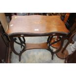 **AWAY** A 19th century mahogany and satinwood inlay serpentine side table, under tier with reversed