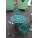 A 20th Century cast metal garden table and two chairs (3)