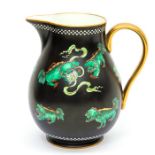 An early 20th Century Wedgwood jug decorated with green dragons
