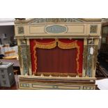 A model Urania Theatre with various backdrops and sliding characters