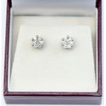 A pair of 9ct white  gold and diamond cluster stud earrings, total gross weight approx 1.5gms
