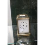 Edwardian brass carriage clock with repeater, Roman numerals A/F