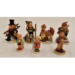 Group of seven Hummel figures including a boy with staff, 315