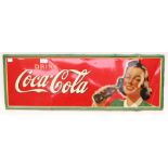 An enamel 1940's Coca-Cola sign