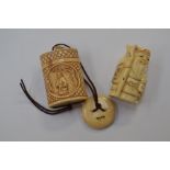 A Japanese Bone Inro and button Netsuke, it depicts an Oriental gentleman on both sides of the