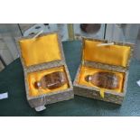 **REOFFER IN A&C NOV £30-£40** A pair of glass Chinese snuff bottles, boxed, intricately depicting