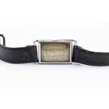 A 1930's tank watch, Autorist REGd, by Roger Harwood, chrome plated, leather strap, automatic swivel