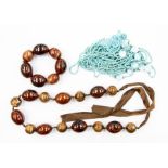 **AWAY** Artisan glass, formed beads threaded on ribbon with matching bracelet, together with