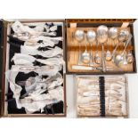 A box of six silver plated fish knives and forks, boxed set of dessert spoons, together with a