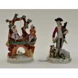 Early 20th Century figure of a musician, German, along with late 19th Century Staffordshire figure
