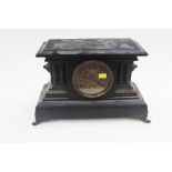 **AWAY** A French revival 19th Century style ebonised and gilt metal clock, carved pillars on