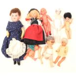 An SFBJ bisque head girl doll, together with a celluloid and other dolls (parcel lot)