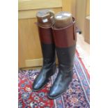 A pair of riding boots, leather with wooden stretchers