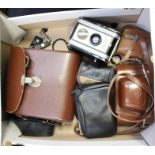 Collection of five cameras, pair of binoculars and game case