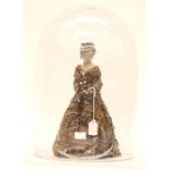 Doll of a lady in Victorian costume, approx 30 cms in height complete with glass dome cover