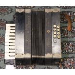 **AWAY** A Ludwig Piano Tone accordion (Melodeon with piano keys)