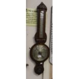 An oak cased barometer, circa 1900