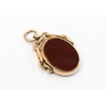 A 9ct rose gold swivel fob, bloodstone and carnelian oval stone set, size approx. 25mm,with chain