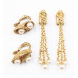 A pair of 9ct gold and pearl clip on earrings, comprising two cultured pearls set to each within a