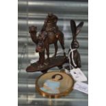 Cold painted bronzed figure of Arabs on camel, bronze item and a miniature of a young girl in