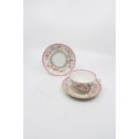 **MERGE** An Adderleys cup and saucer, along with another saucer decorated with exotic birds and