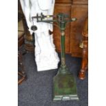 An early 20th Century iron weighing scales.