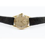 An 18ct gold  Doxa anti magnetique gents watch, round champagne dial, batons and subsidiary dial,
