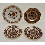 Four Royal Crown Derby plates including two Imari 1128 plates, Old Imari and 8687 pattern (all