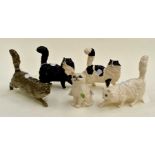 Beswick late 20th Century group of five cats including grey, two black and white and two white