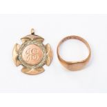 A 9ct gold ring, hallmarks rubbed, together with a 9ct gold medallion, uninscribed to reverse,