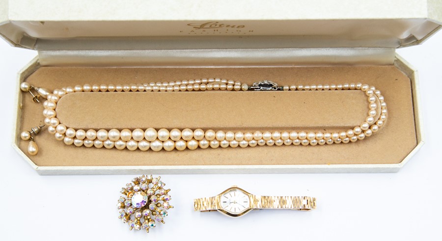 An Avia ladies bracelet watch; a duo strand of Lotus fashion pearls and a brooch - Image 2 of 2