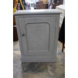 **AWAY** Pale grey painted cupboard, with decorative flower design.