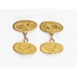 A pair of 18ct gold cufflinks with oval engraved monogrammed  terminals, total gross weight
