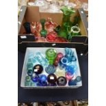A collection of late Victorian and later coloured glass, cranberry, green and blue, including