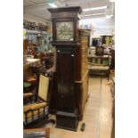 A brass faced 30 hour long case clock by Samuel Graves, circa 1730. Bird cage movement and inlaid