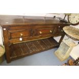Oak three drawer dresser, 18th Century with brass handles and plank bottom shelf