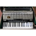 Vintage Kohner Atlantica deluxe accordian, black and silver with gold decoration in original case