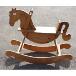 **AWAY** Late 20th Century wooden rocking horse