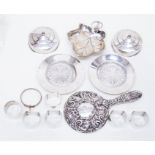 Assorted silver and plated wares to include napkin rings, hand mirror, plated art deco butter dishes