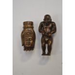 **REOFFER IN A&C NOV £30-£40** A  dark wood Japanese erotic Netsuke, the Netsuke depicts an Oriental