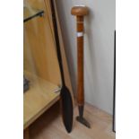 **AWAY** An early 20th Century beech handled tilers tool and a mid 20th Century wooden paddle