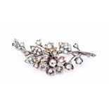 A Victorian diamond spray brooch, comprising floral and leaf decoration set with old cut and rose