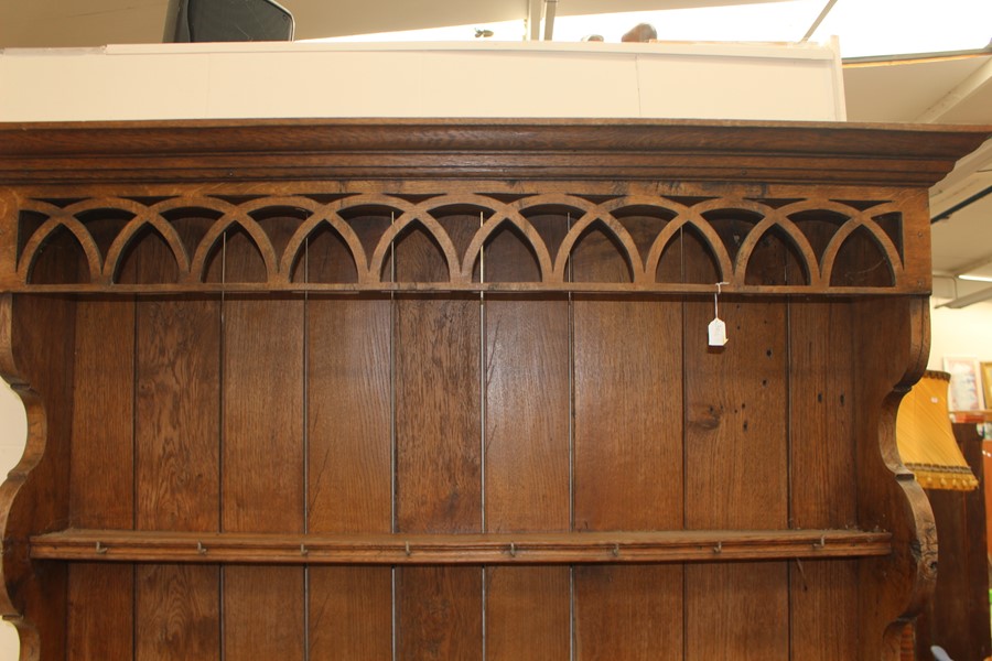 A  20th Century oak dresser and plate rack. The base having two drawers with brass handles and two - Image 4 of 5