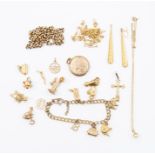 A collection of 9ct gold and unmarked yellow metal jewellery to include earrings, charms, bracelet