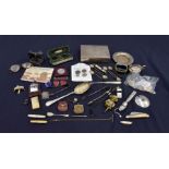 A collection of plated items including whistles, pen, knives, coins, lighters and spectacles (Q)