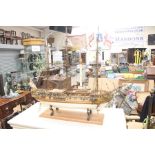 Model of a ship, on wooden base, height approx. 70cm.