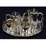 A plated tea set along with tray including water (jug??), tea pots, sugar bowl and milk jug,