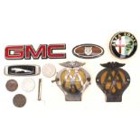 Vintage AA car badges and car badges along with British coins